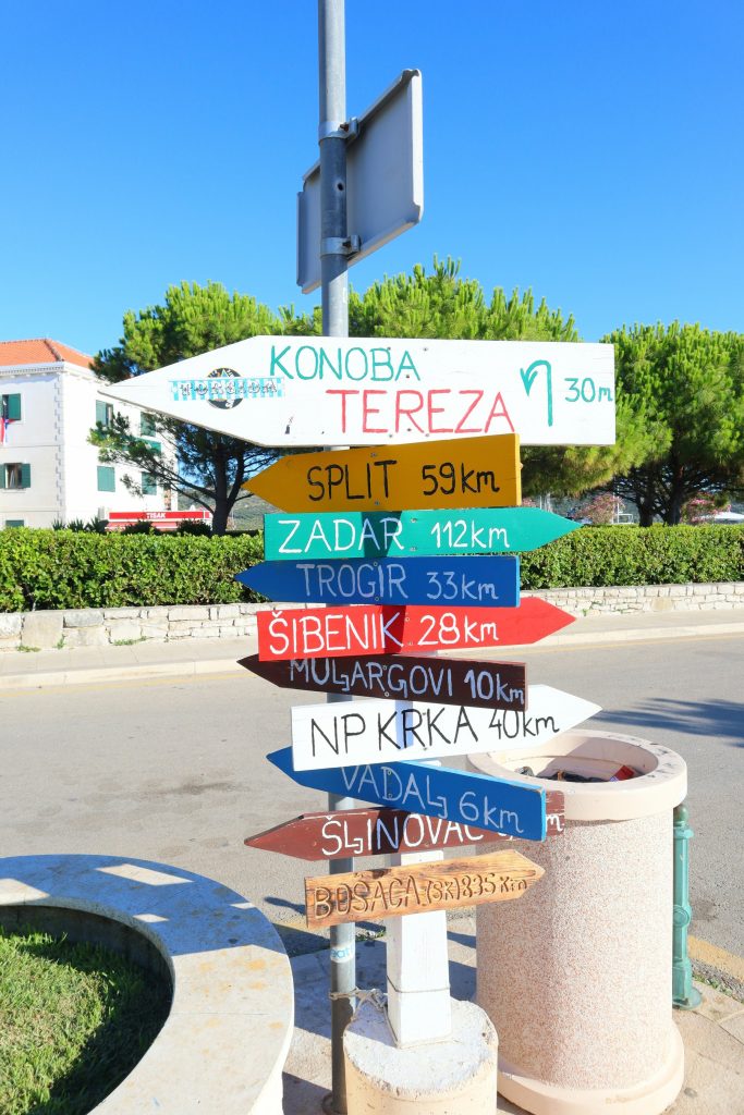 A signpost pointing the way to Croatian towns