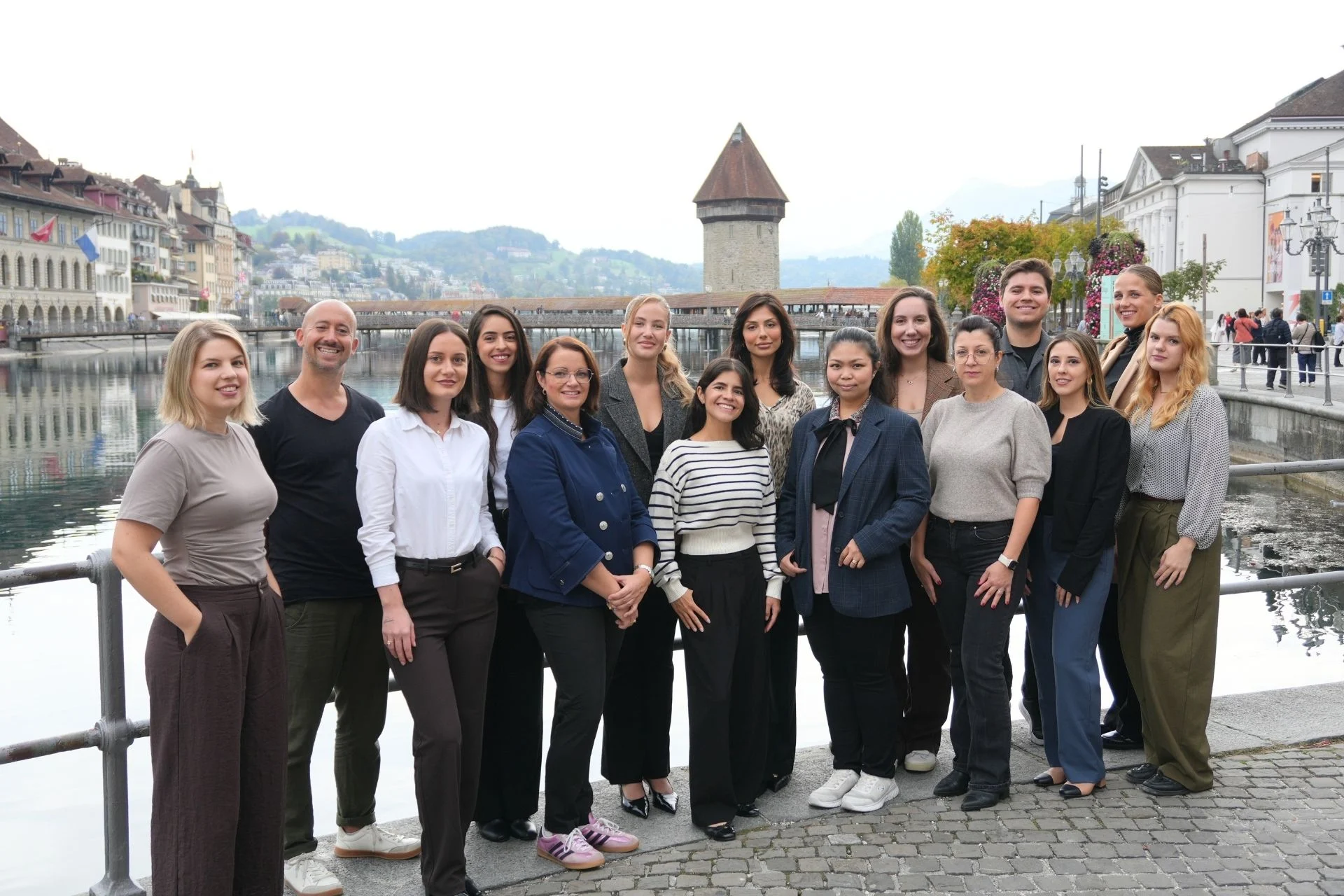 The Salona Consulting team in front of Lucerne's Chapel Bridge.